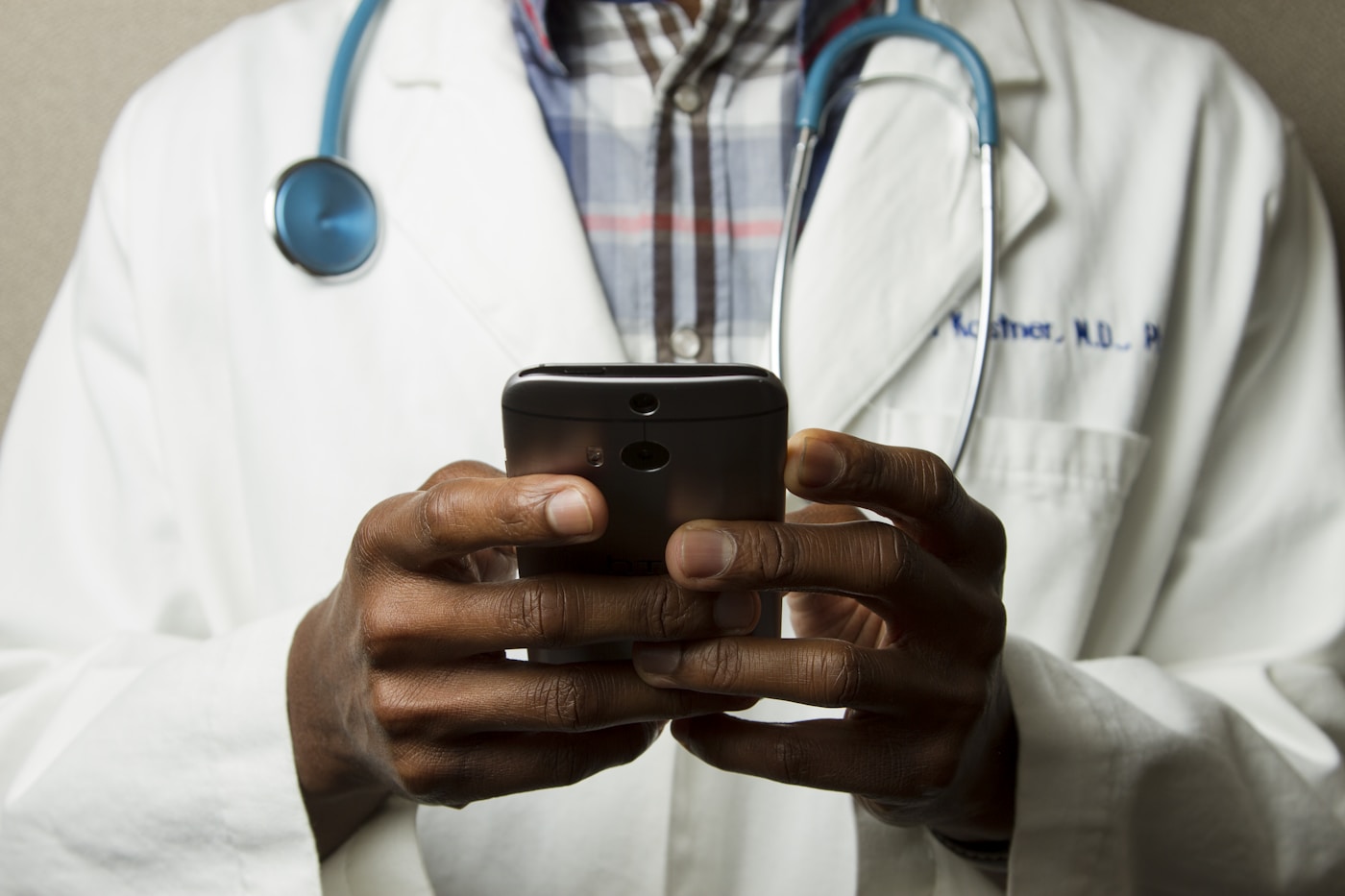 A healthcare professional speaking with a patient